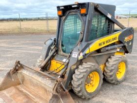 new holland skid steer vs john deere|new holland skid loader problems.